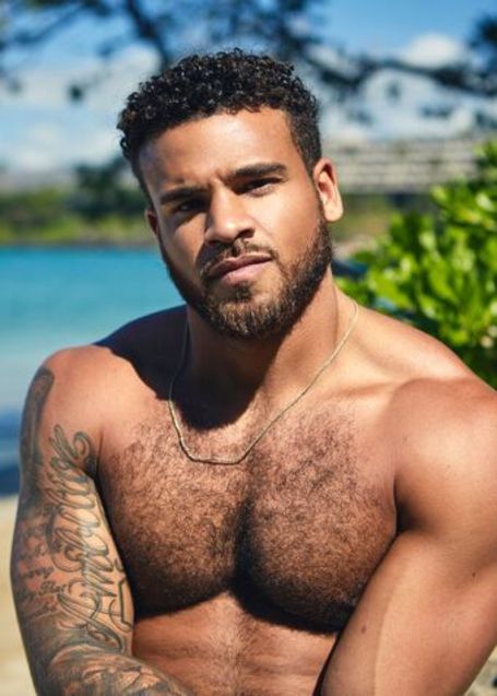 cory shirtless in the pool side 